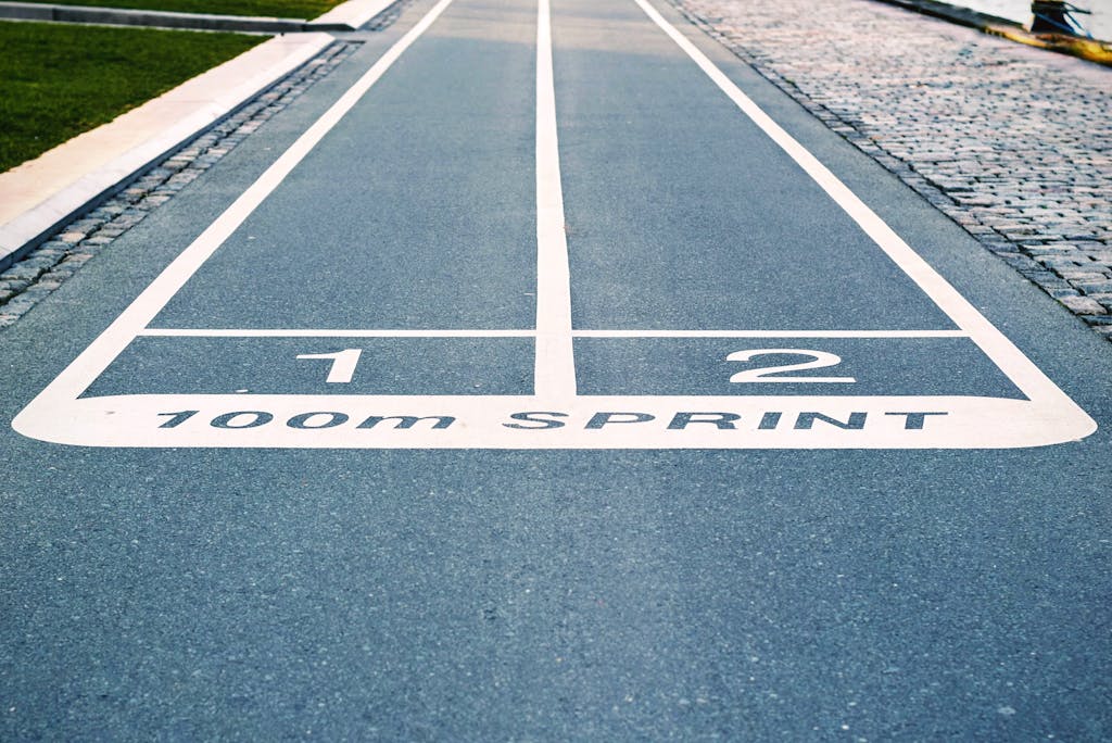 Blue Concrete Pavement With 100m Sprint Paint